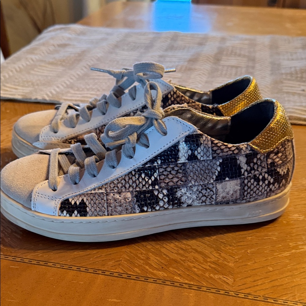 P448 Women's Sneakers in Black and Gold Metallic accents.